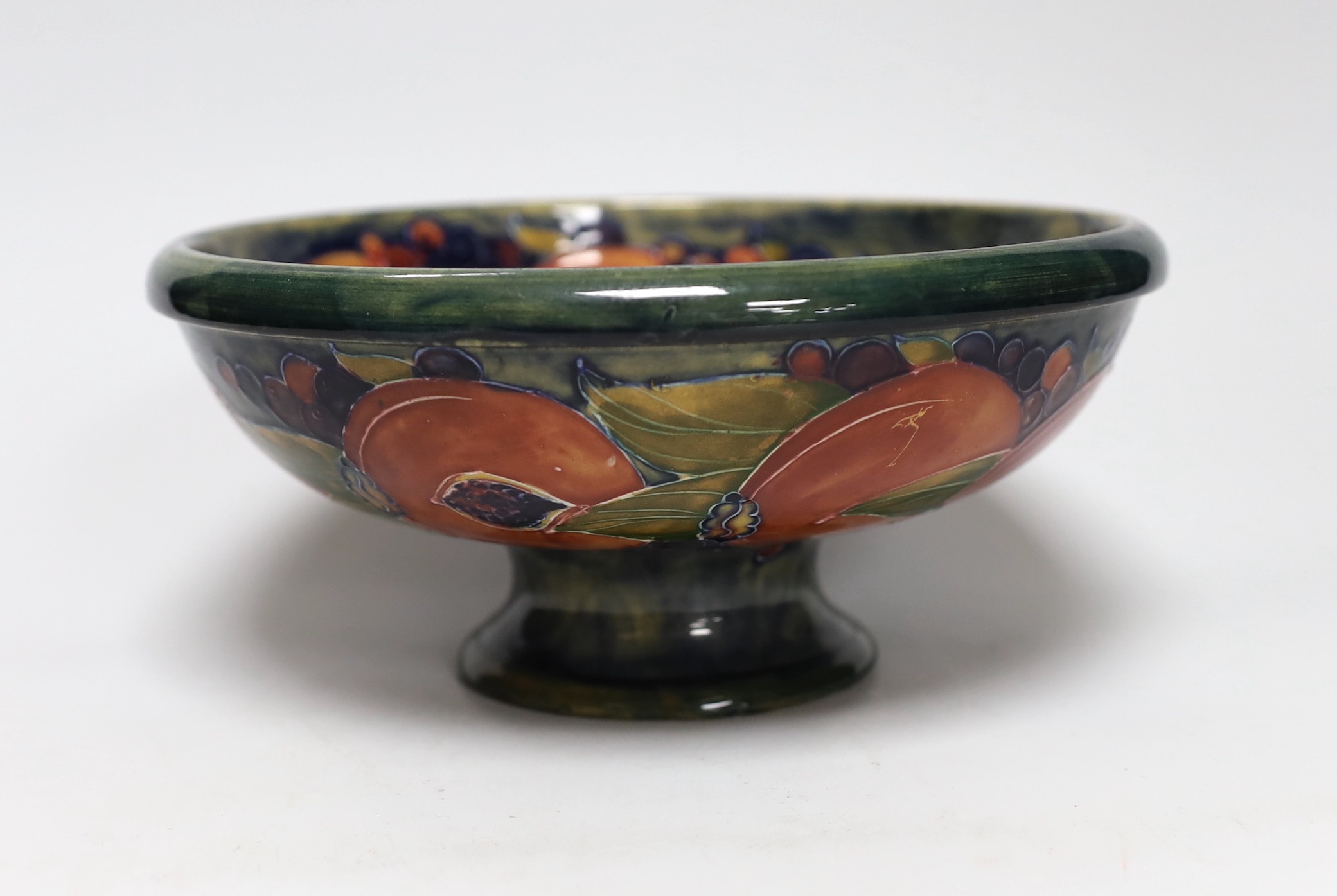 A Moorcroft Pomegranate pedestal bowl, 1920s, 23.5cm diameter